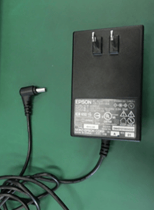 The recalled adapter bears the internal part code “EADP-16CB B